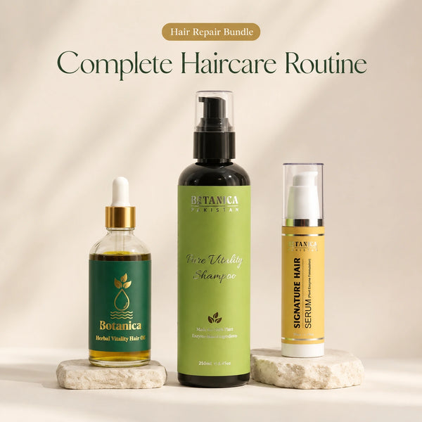 Three Botanica Profession haircare products arranged on stone slabs against a warm beige background: a green hair oil bottle, a large green hair repair shampoo bottle, and a gold/yellow signature hair serum bottle. Text at the top reads 'Hair Repair Bundle' and 'Complete Haircare Routine'.
